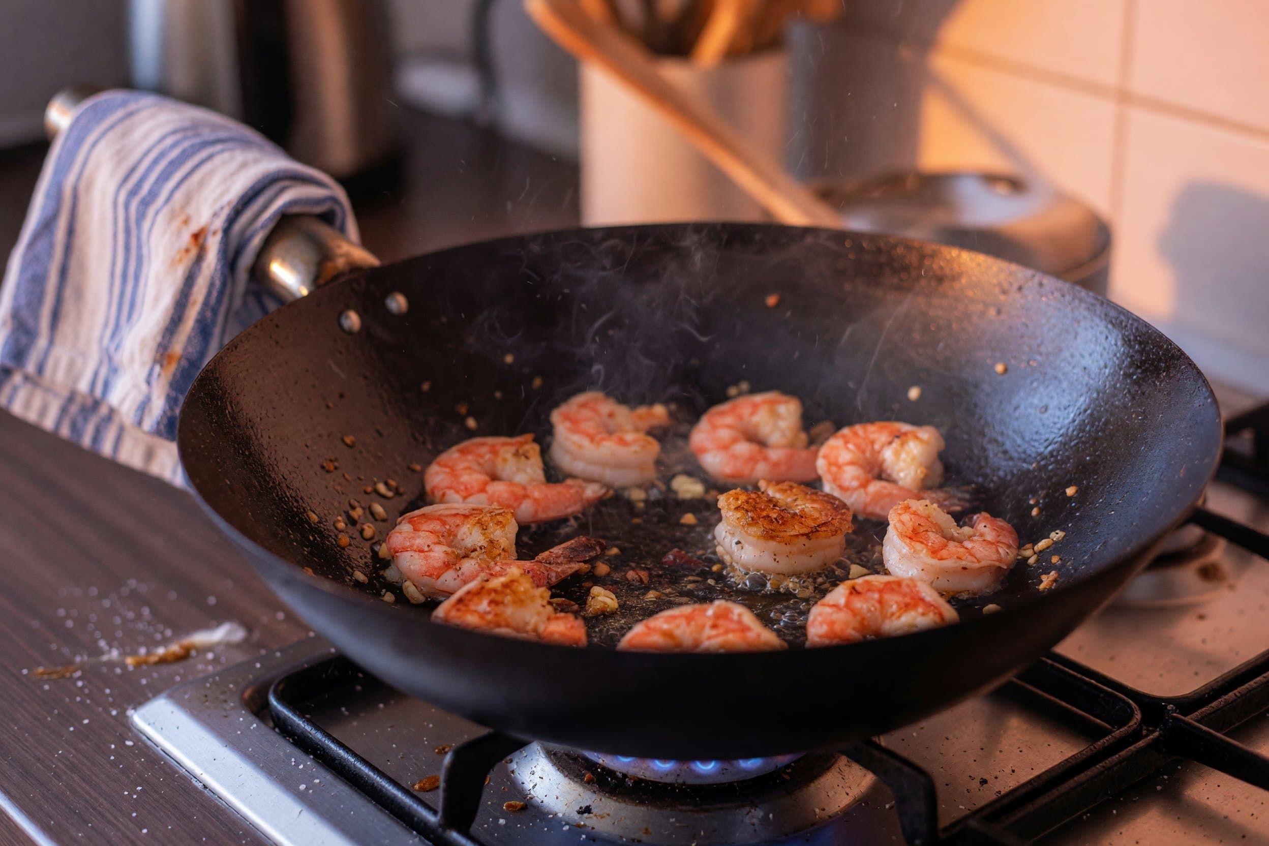 Searing shrimp while preparing American Chinese Chili Lime Shrimp with Stir-Fried Vegetables